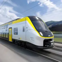 Moderner doppeldecker zug rast mit gelben Akzenten durch eine malerische Landschaft.