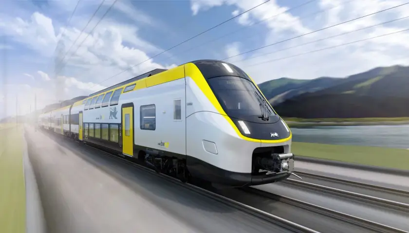 Moderner doppeldecker zug rast mit gelben Akzenten durch eine malerische Landschaft.